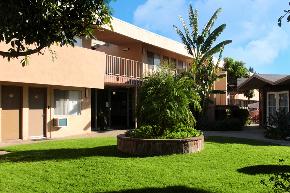 This image displays exterior photo of Academy Pointe Apartments